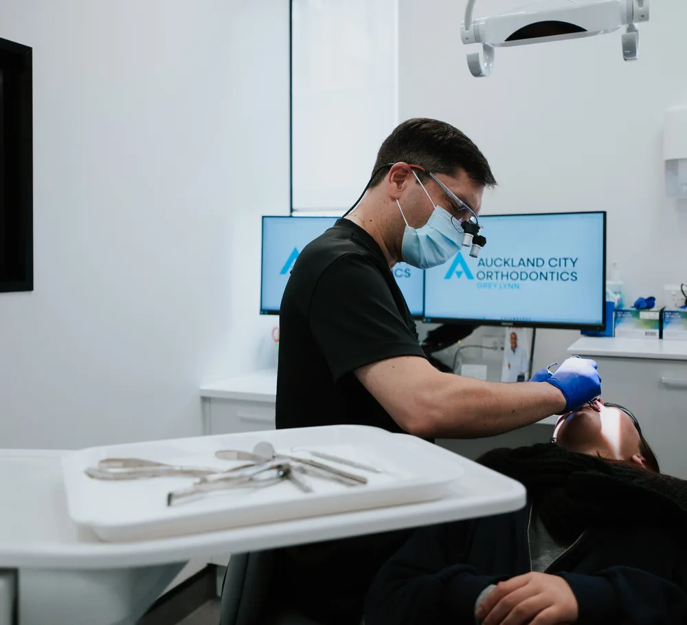 A Specialist Orthodontist treating a patient at Auckland City Orthodontics