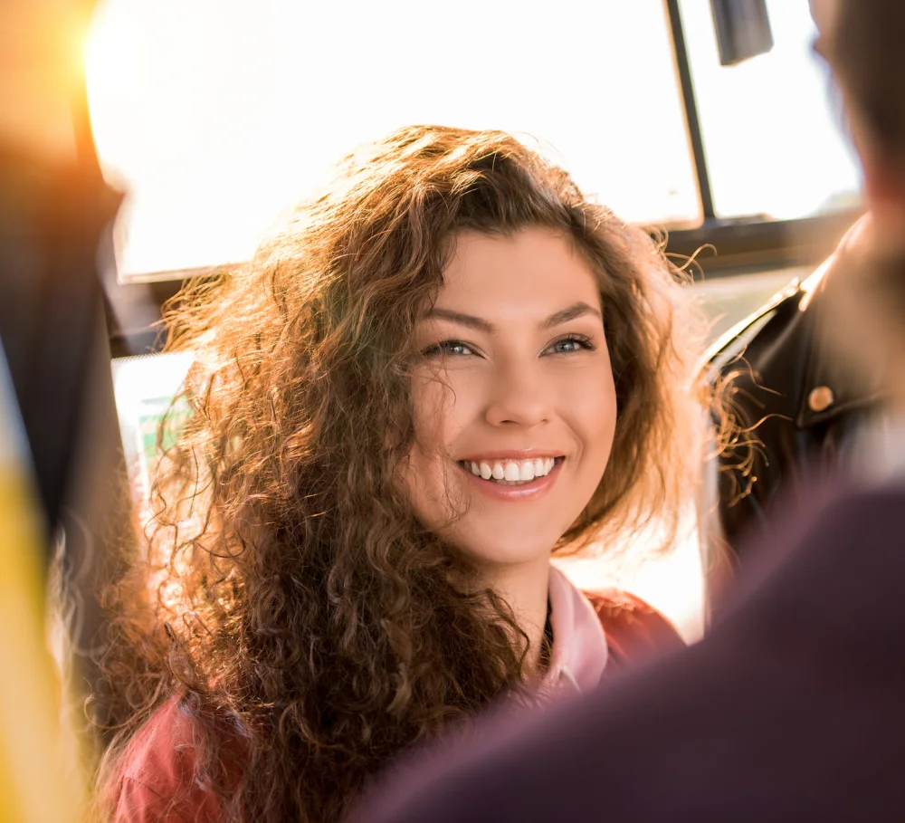 A smiling adult