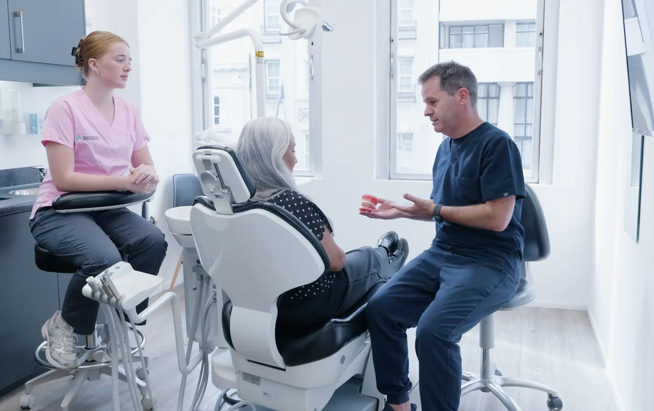 An adult patient in a consultation at Auckland City Orthodontics