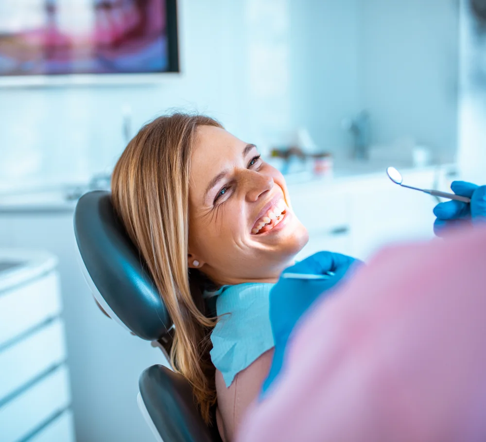 A patient being examined in the dental chair