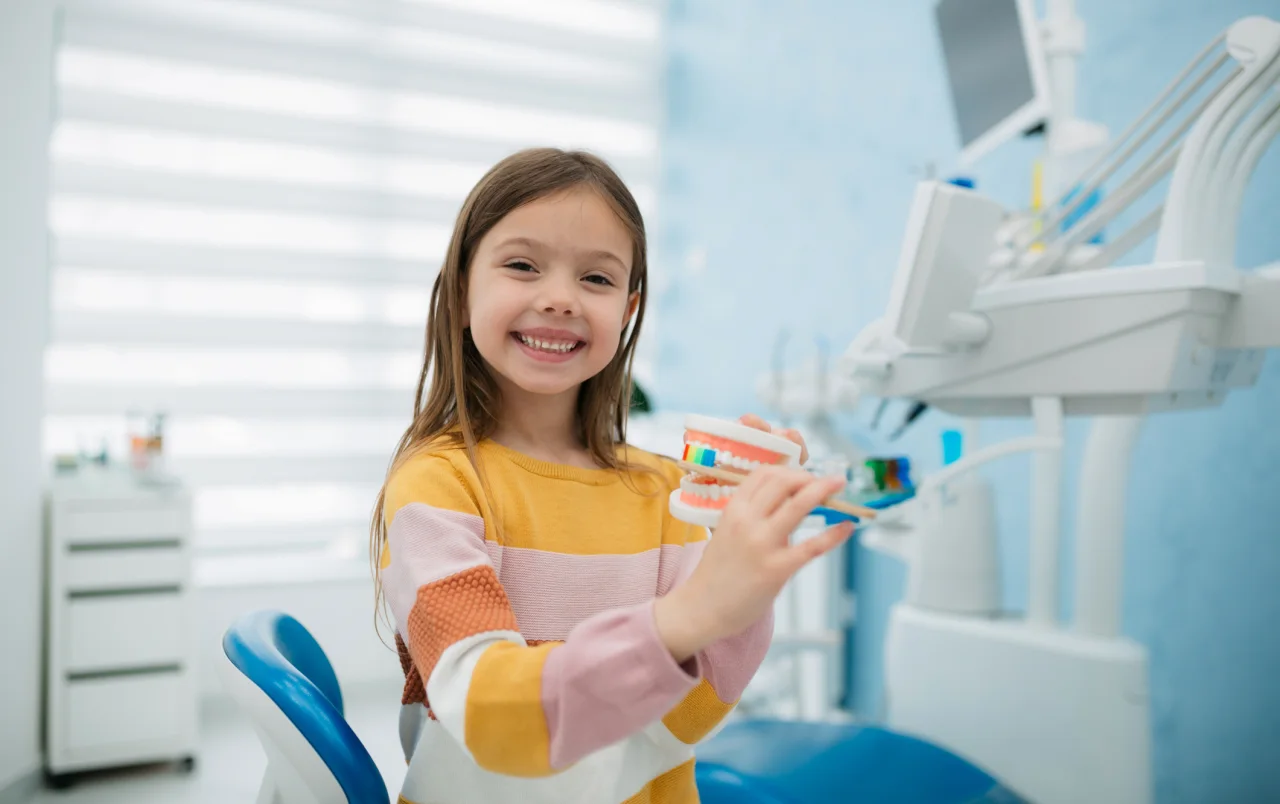 A child with a digital scanner at Auckland City Orthodontics