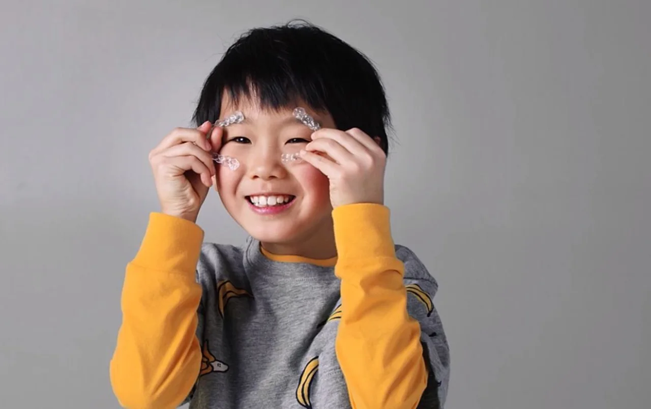A happy young child smiling