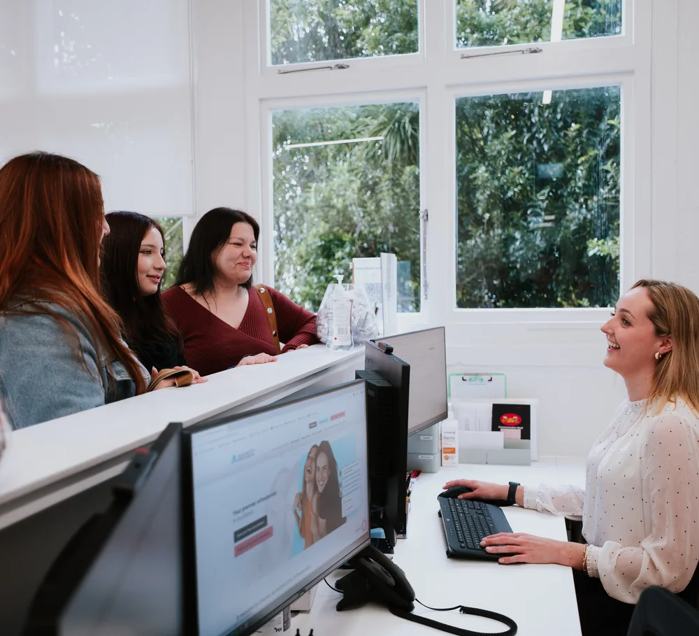 Patient chatting with reception at Auckland City Orthodontics