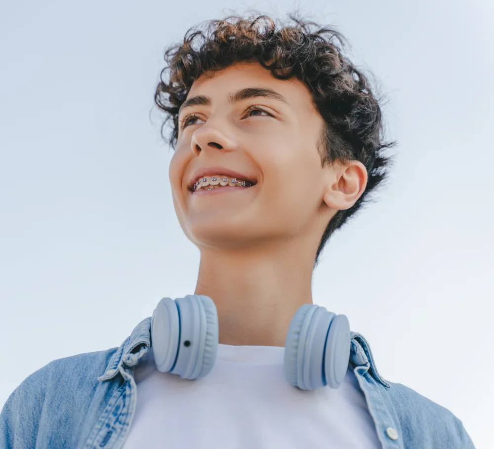 A teenager with braces