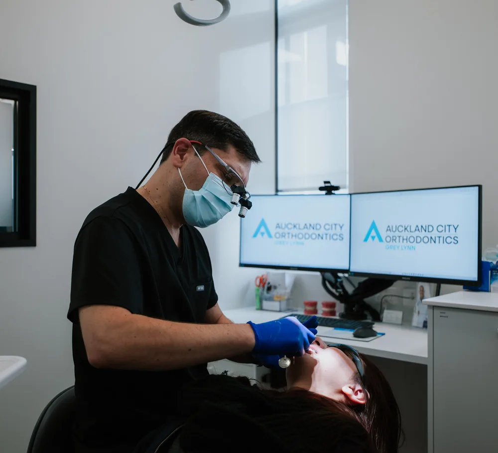 A Specialist Orthodontist treating a patient at Auckland City Orthodontics