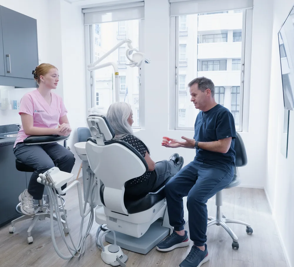 A Specialist Orthodontist consulting with a patient at Auckland City Orthodontics
